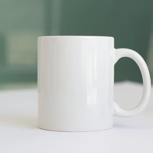 11oz white coffee mug on white table mockup
