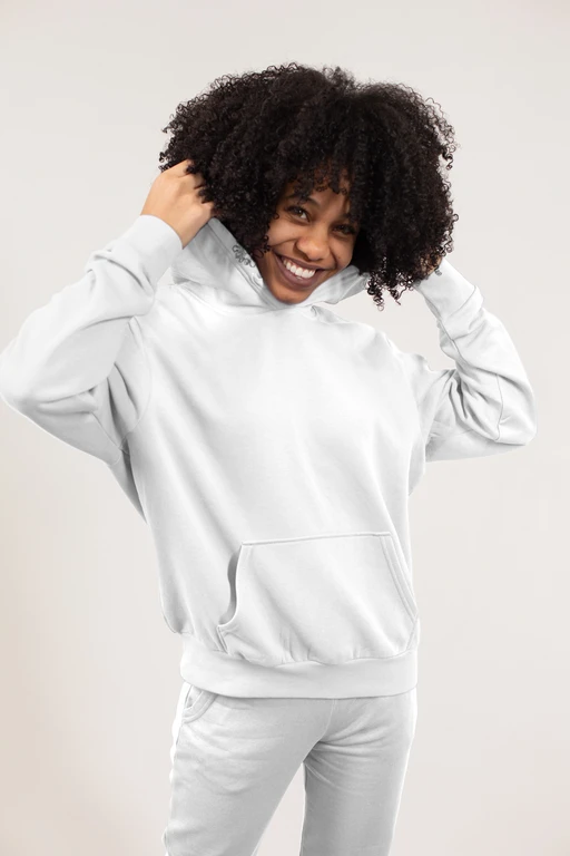 Young woman wearing hoodie in studio mockup